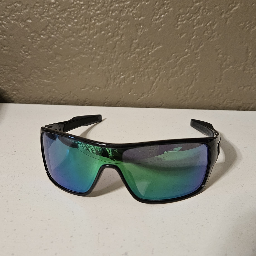 Stylish Black Sunglasses with Green Lenses